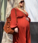 A very Pregnant Jessica Simpson was out and about shopping in the Beverly Hills area of California on February 25, 2012 wearing a long dress with a pair of very high heels. She and her assistant stopped by Saks Fifth Avenue for a few items before heading on their way.