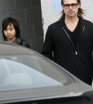 Actor Brad Pitt and son Maddox Jolie-Pitt buying a guitar and an amplifier at Guitar Center in Hollywood, CA on March 1, 2012