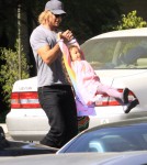 Gabriel Aubry picking up daughter Nahla from school and having some on the way to the car in Los Angeles, CA on March 2, 2012.