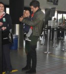 Orlando Bloom arrives at LAX Airport with his son Flynn to catch a flight out of town on March 4, 2012 in Los Angeles, CA.