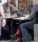 Sienna Miller and boyfriend Tom Sturridge out at a cafe in London (March 30)