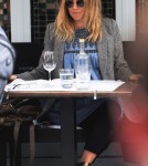 Sienna Miller and boyfriend Tom Sturridge out at a cafe in London (March 30)
