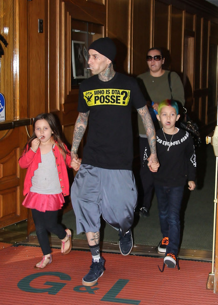 Blink 182 drummer Travis Barker takes his children Landon and Alabama to the doctor’s office on March 12, 2012 in Beverly Hills, CA. The family all walked out with lollipops after the visit. Landon looks to be a chip off the old block, with his hair dyed bright blue and purple!