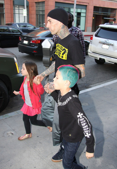 Blink 182 drummer Travis Barker takes his children Landon and Alabama to the doctor’s office on March 12, 2012 in Beverly Hills, CA. The family all walked out with lollipops after the visit. Landon looks to be a chip off the old block, with his hair dyed bright blue and purple!