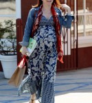 Alyson Hannigan shows off her baby bump in a dress while doing some shopping in Los Angeles. The "How I Met Your Mother Star", who is currently expecting her second child with husband Alexis Denisof, was all smiles as she walked to her car.