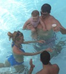 Supebowl champ, Eli Manning, relaxes with some beers in the pool of his Miami Beach hotel. Manning is joined by his wife, Abby McGrew, and baby daughter Ava Frances