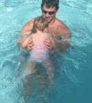 Supebowl champ, Eli Manning, relaxes with some beers in the pool of his Miami Beach hotel. Manning is joined by his wife, Abby McGrew, and baby daughter Ava Frances