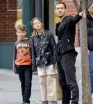 Jude Law has a busy afternoon as he takes his children Rudy and Iris street art shopping in Soho, New York City