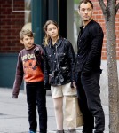 Jude Law has a busy afternoon as he takes his children Rudy and Iris street art shopping in Soho, New York City