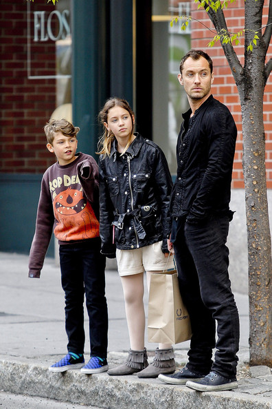 Jude Law has a busy afternoon as he takes his children Rudy and Iris street art shopping in Soho, New York City