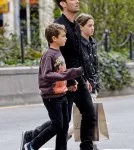 Jude Law has a busy afternoon as he takes his children Rudy and Iris street art shopping in Soho, New York City