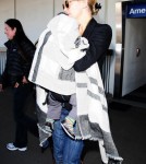 Kate Hudson returned from her Cancun, Mexico at LAX with her two boys Ryder and Bing in Los Angeles, California on April 1, 2012.
