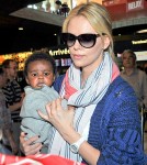 Charlize Theron with her son Jackson at LAX airport in Los Angeles, CA May 7