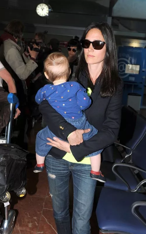 Jennifer Connelly & Paul Bettany Touch Down With Daughter Agnes