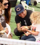 Pete Wentz enjoys a fun Sunday with girlfriend Megan Camper and his son Bronx at the Farmer's Market