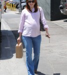 Pregnant Alyson Hannigan is all smiles as she leaves Tavern in Brentwood, California on June 3, 2012