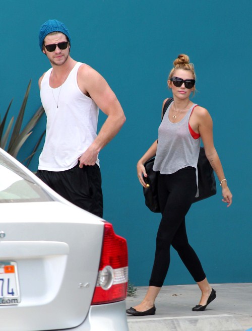 Miley Cyrus and her fiance, actor Liam Hemsworth, were seen leaving Pilates class in Studio City, California on July 13, 2012.