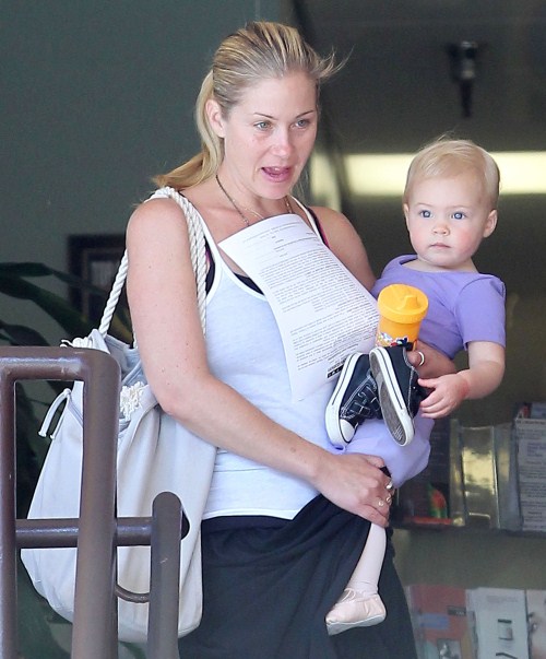 Christina Applegate and her daughter Sadie stopping by a Health And Wellness center while out running errands in Sherman Oaks, California on August 22, 2012.