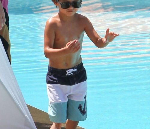 Jennifer Lopez and her boyfriend Casper Smart take her kids Emme and Max to the pool at their hotel in Miami, Florida on August 30, 2012.