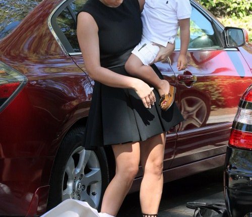 Kim and Kourtney Kardashian arrived at a church in Thousand Oaks, California on August 26, 2012. Kourtney had her children daughter Penelope and son Mason Disick with them for the service. Kim made sure Mason was taken care of while mom Kourtney kept his new baby sister covered on the way into the church.