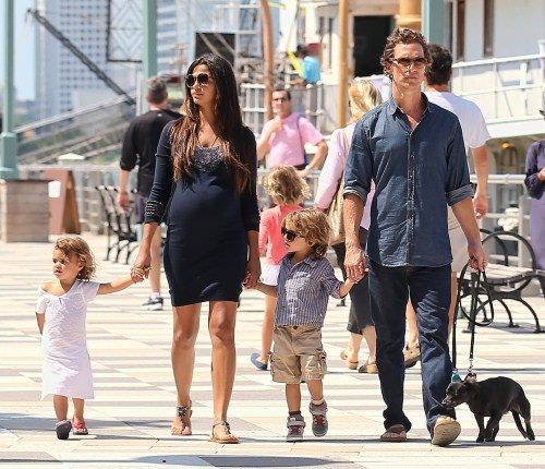 Matthew McConaughey takes the day with his family on the coast in New York, New York on August 26th, 2012. Pregnant wife Camila Alves held onto Vida while Matthew clutched onto Levi.