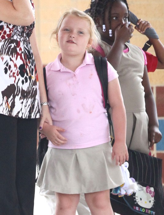 'Here Comes Honey Boo Boo' star Alana Thompson waiting with her teacher for her ride home from school in McIntyre, Georgia on September 12, 2012.