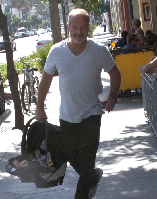 Actor Kelsey Grammer, his wife Kayte Walsh and their daughter Faith seen leaving the Coffee Bean And Tea Leaf after getting a coffee in Beverly Hills, California on September 16, 2012.