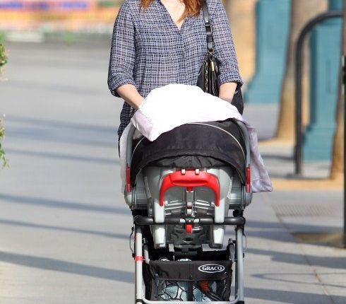 Alyson Hannigan was spotted taking her baby girl, Keeva Denisof, for a walk in Santa Monica, California on September 28, 2012.