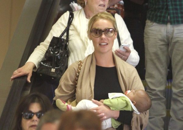 Katherine Heigl, her mom Nancy, husband Josh and new baby Adalaide arriving on a flight at LAX airport in Los Angeles, California on September 6, 2012. The family was met at the airport by her adopted sister Meg Heigl