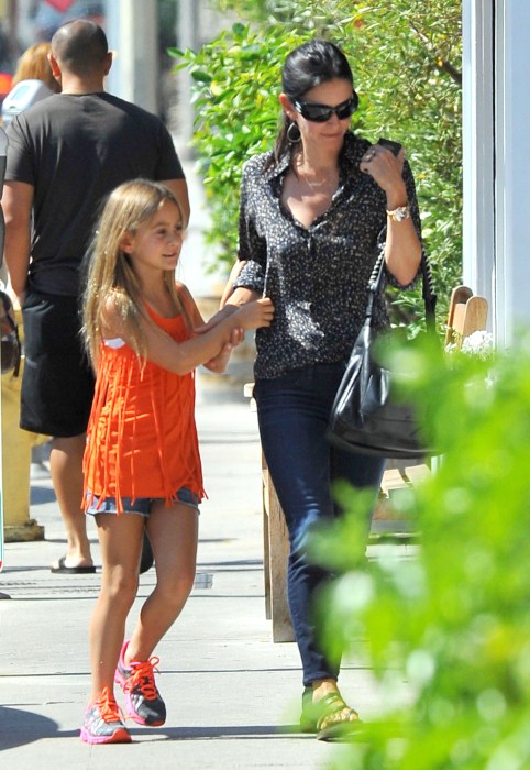 'Cougar Town' actress Courteney Cox and her daughter Coco Arquette out for lunch and some shopping with a friend at the Brentwood Country Mart in Brentwood, California on September 4, 2012.