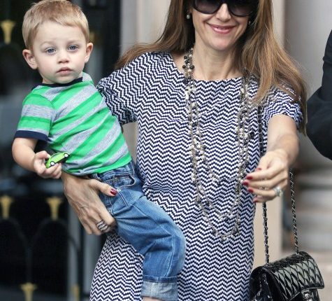 John Travolta and his wife Kelly Preston enjoy lunch with their son Benjamin at Pizza Pino on September 12, 2012 in Paris, France