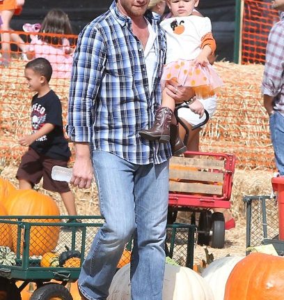 Ian Ziering and his wife Erin take their daughter Mia to the Mr. Bones Pumpkin Patch in West Hollywood, California on October 6, 2012.