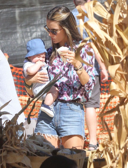 Alessandra Ambrosio and her fiance Jamie Mazur take their children Anja and Noah to the Mr. Bones Pumpkin Patch in West Hollywood, California on October 14, 2012.