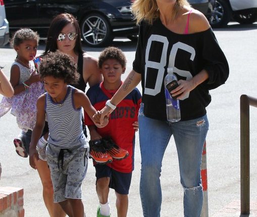 Heidi Klum and her kids all cheered for their older brother Henry as he played in his flag football game in Los Angeles, California on September 29th, 2012.