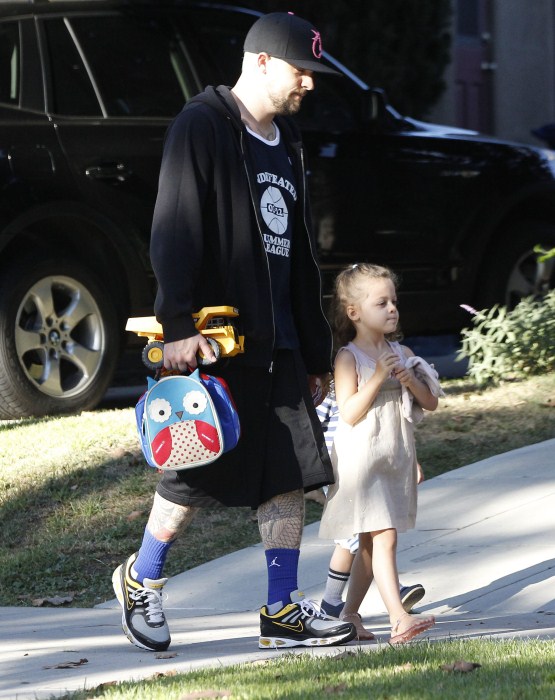 Good Charlotte singer Joel Madden tackles daddy duties as he walks his daughter Harlow and son Sparrow to school on October 15, 2012 in Los Angeles, California.