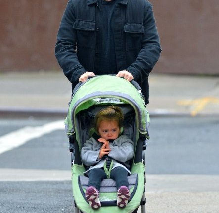 Matt Damon takes his daughter Stella for a walk on a chilly day in New York City, New York on October 9, 2012.