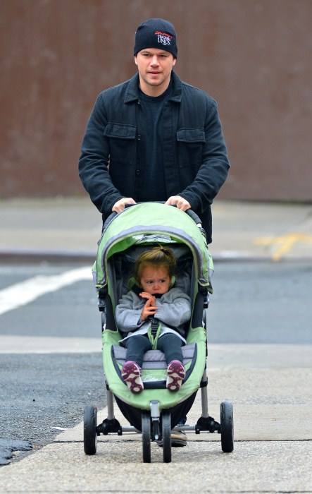 Matt Damon takes his daughter Stella for a walk on a chilly day in New York City, New York on October 9, 2012.