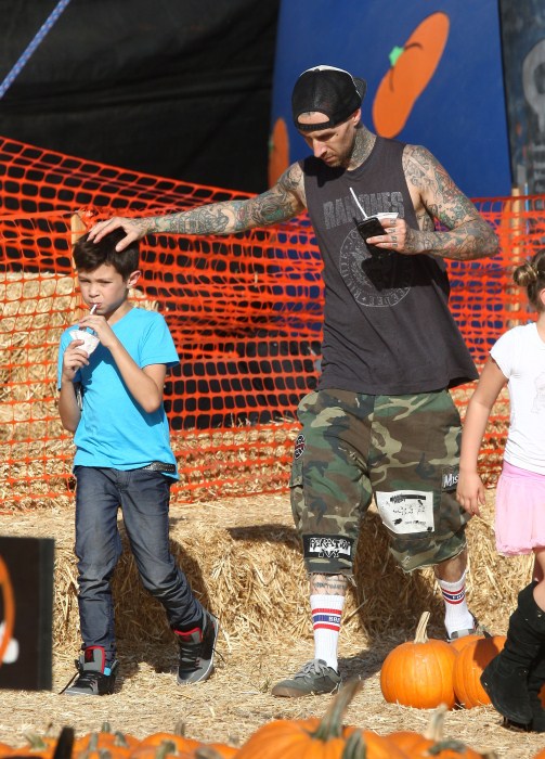 'Blink 182' drummer Travis Barker takes his kids Alabama and Landon to the Mr. Bones pumpkin patch in West Hollywood, CA on October 18, 2012.
