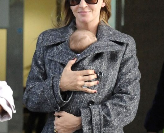 Uma Thurman and Rosalind Luna arrive at Heathrow Airport from Los Angeles on October 17, 2012 in London, England.