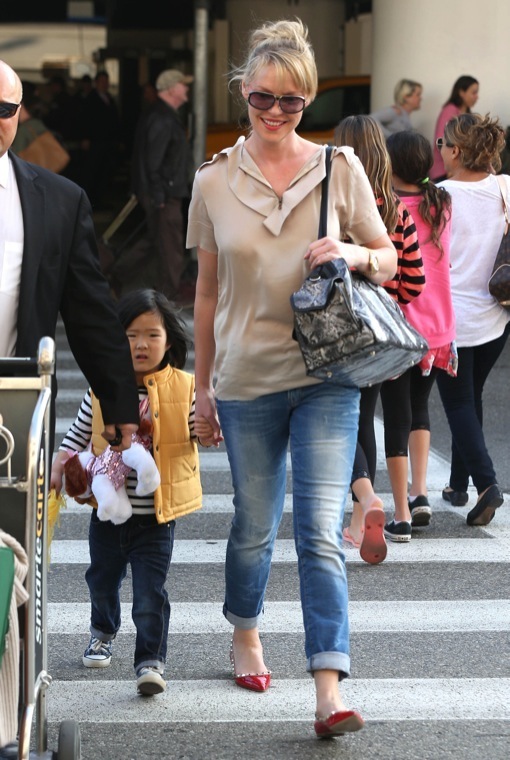 Katherine Heigl & Daughter Nancy Arriving On A Flight At LAX