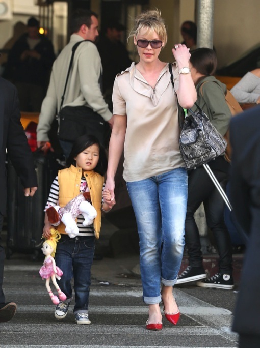 Katherine Heigl & Daughter Nancy Arriving On A Flight At LAX