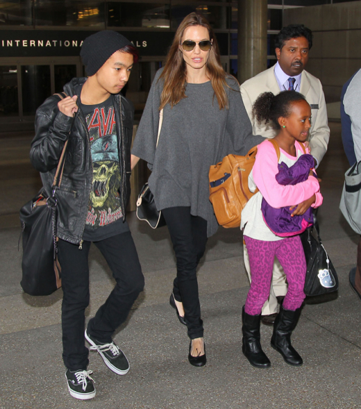 Angelina Jolie And Kids Arriving On A Flight At LAX | Celeb Baby Laundry