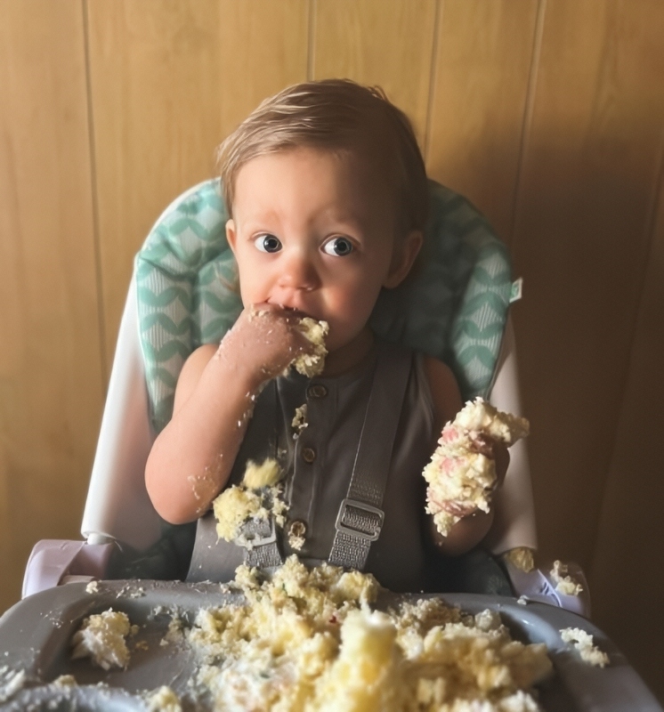 Cove tucks into his birthday cake - Instagram