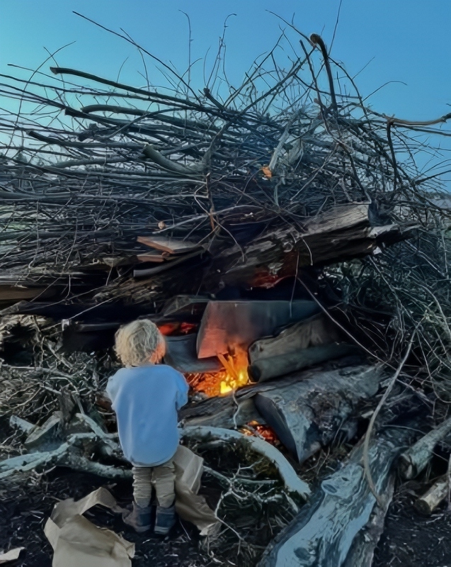 Mateo by the fire - Instagram