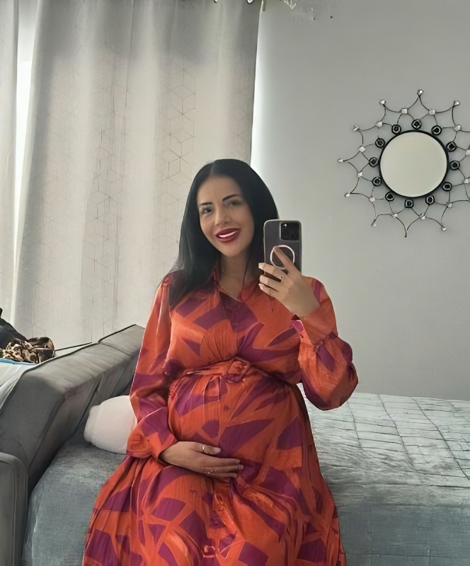 Jasmine posts a photo of herself in a red dress - Instagram